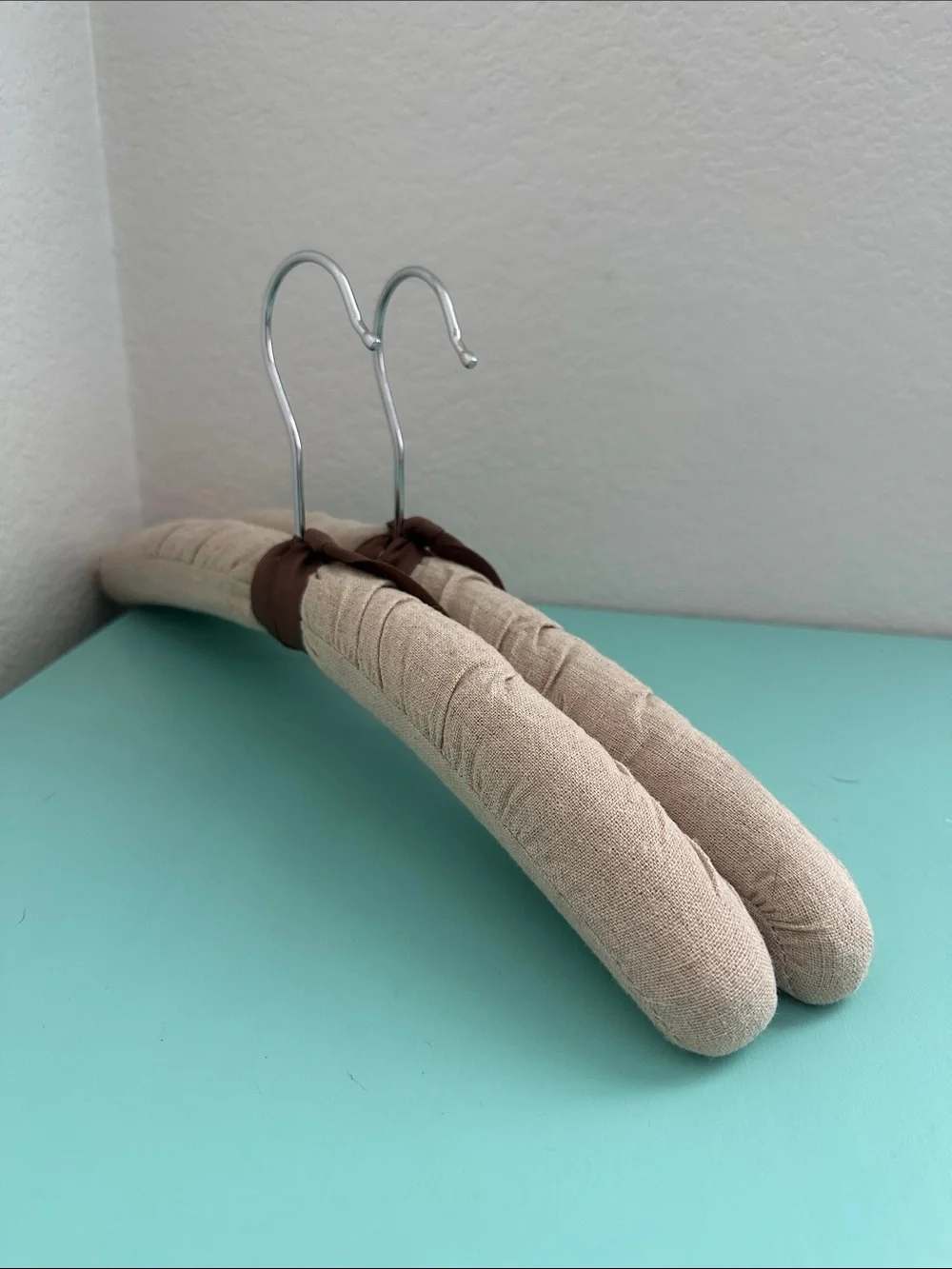 Linen padded heavy duty hangers set of 2ct.-beige color with a bow-brand new.